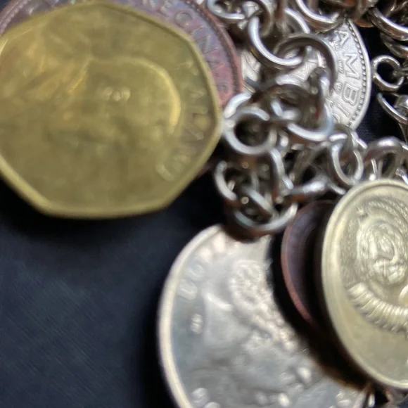 925 sterling silver coin charm bracelet 11 of them on here milor bracelet